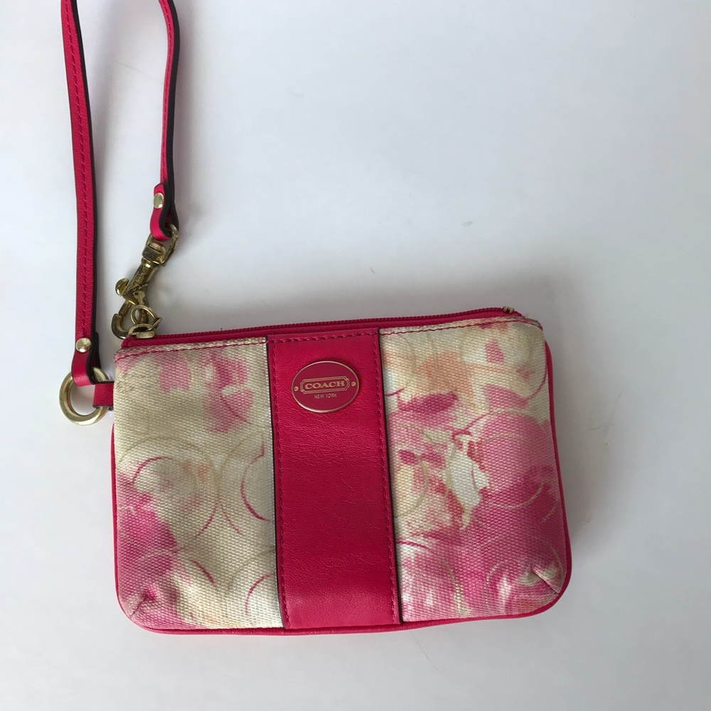 Coach pink wristlet.